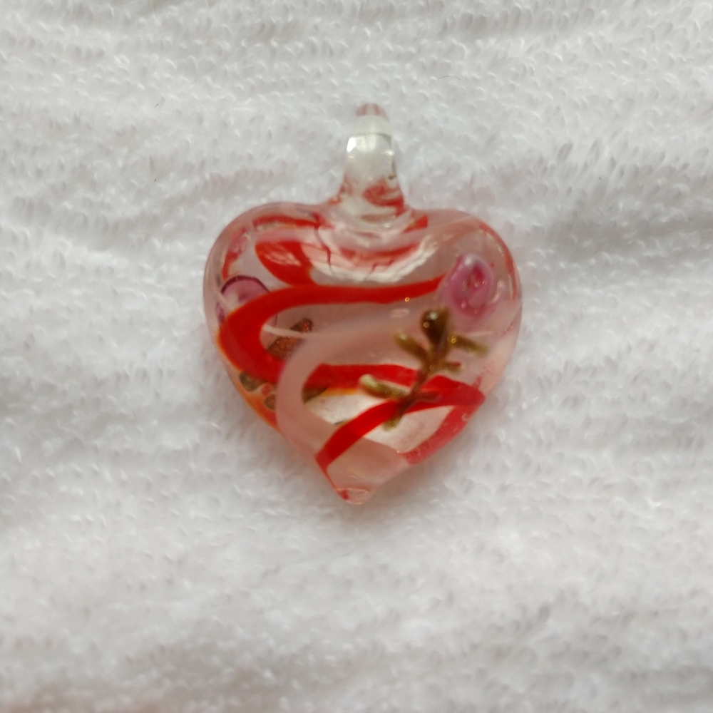 Hand blown glass heart pendant with rose